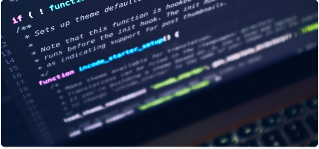 Close-up of computer screen displaying code, highlighting software development.