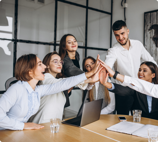 Illustration of a diverse professional team giving high fives in a collaborative office environment.