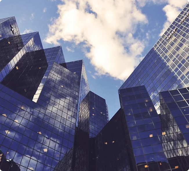 Tall, dark glass metro buildings, exemplifying modern urban architecture.